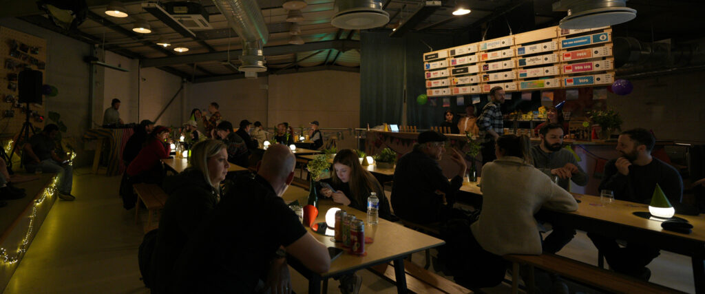 UK Beer Scene - In Praise of the Beer Town - a scean with people in a UK tap room / pub